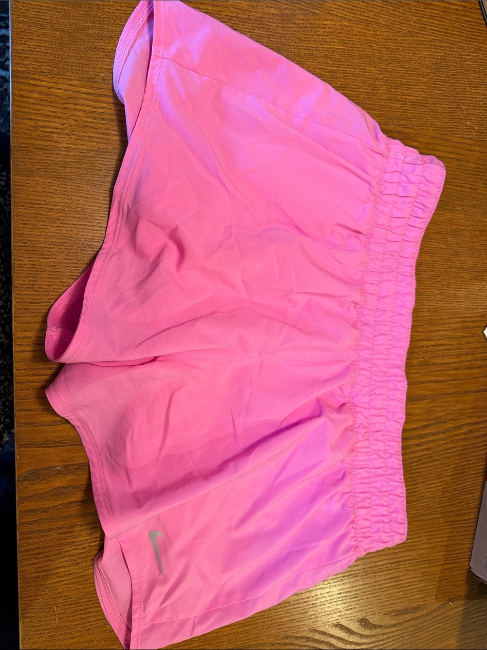 Nike Women'sPink Athletic Shorts with Silver Swoosh